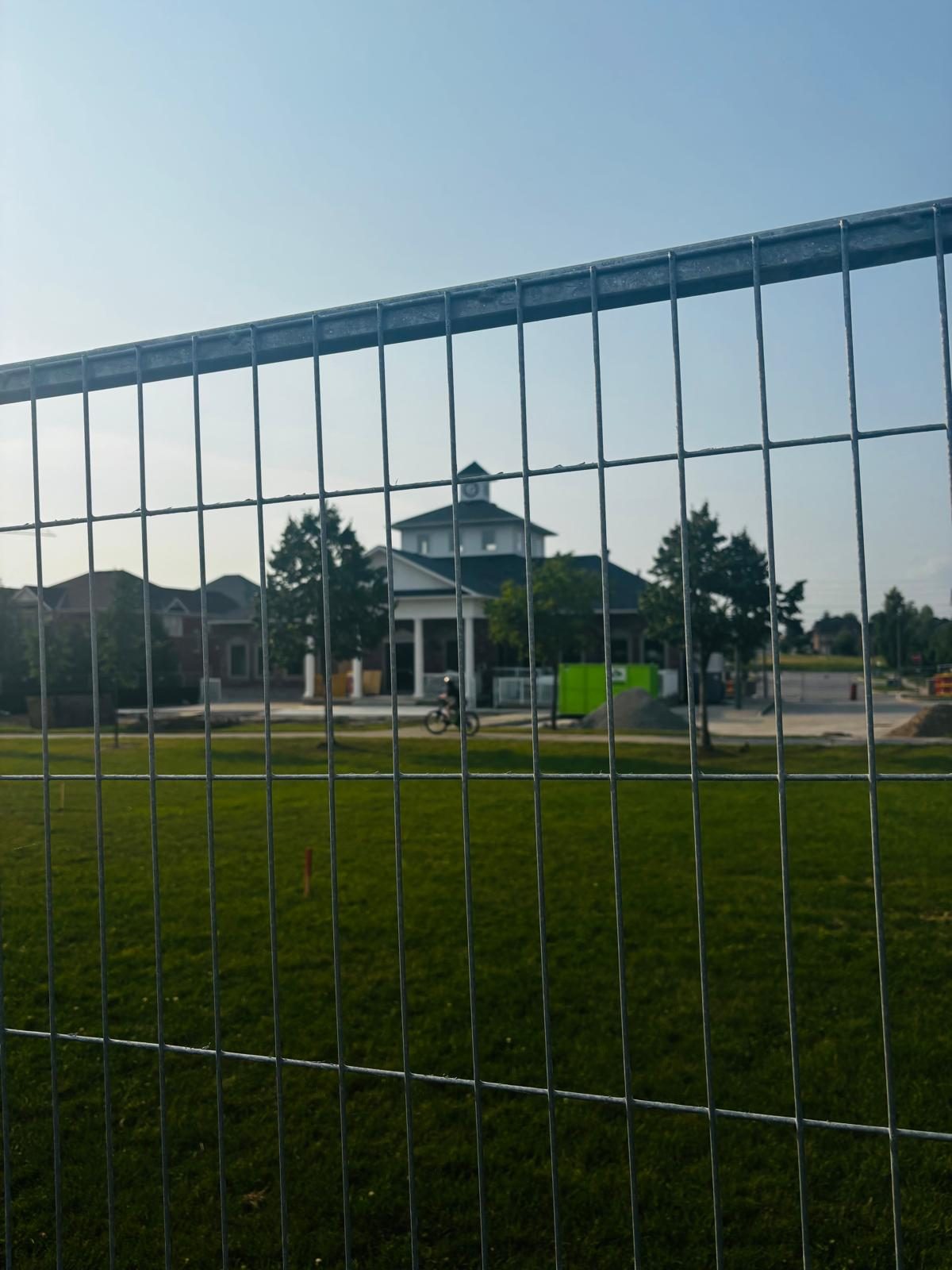 The fence goes up around the Pavilion.