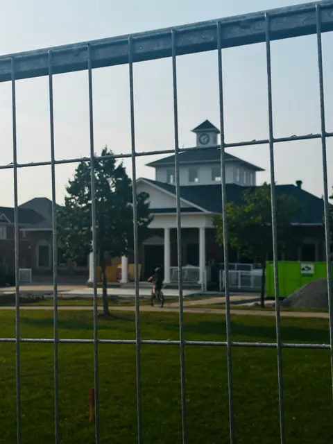 The park, now behind mesh.